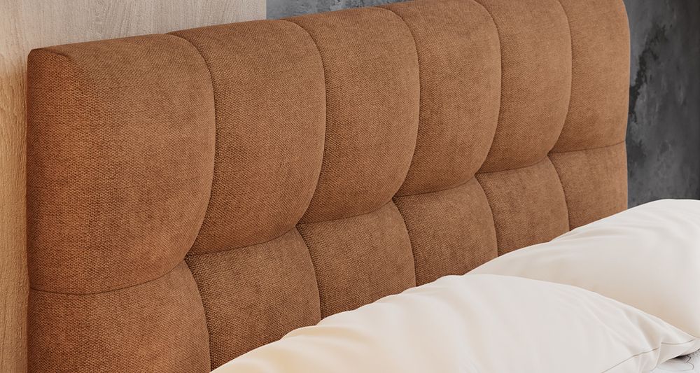 Vergrößern Sie das Kopfteil des Boxspringbettes, das Foto zeigt orange Stoff