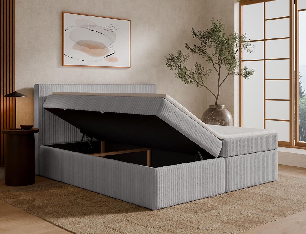 Boxspringbett TILIA ONE mit geöffnetem Bettkasten und Stauraum