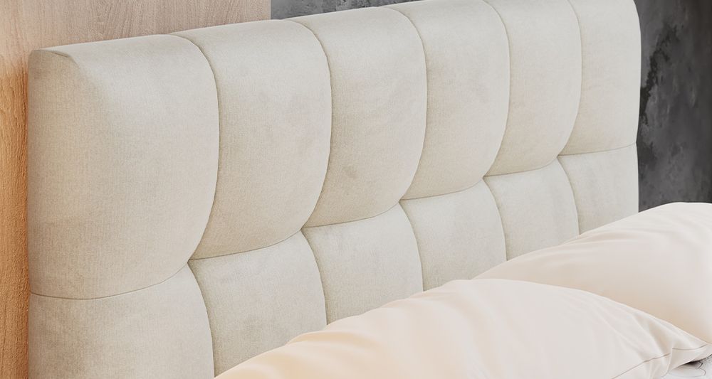 Vergrößern Sie das Kopfteil des Boxspringbettes, das Foto zeigt beige Stoff
