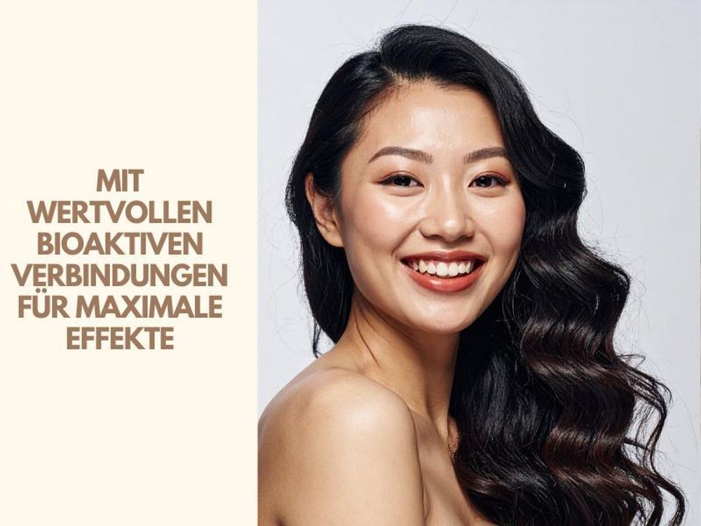 Mit wertvollen, bioaktiven Verbindungen: Asiatische Frau mit seidigem, welligem schwarzem Haar