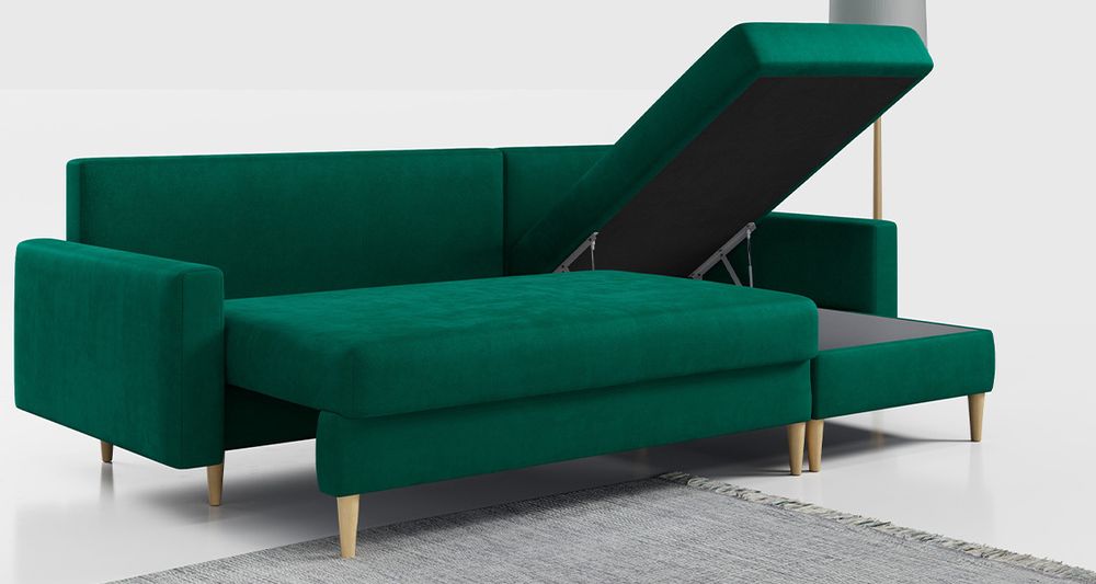 Grünfarbenes Ecksofa aus strukturiertem Stoff. Foto zeigt Bettkasten