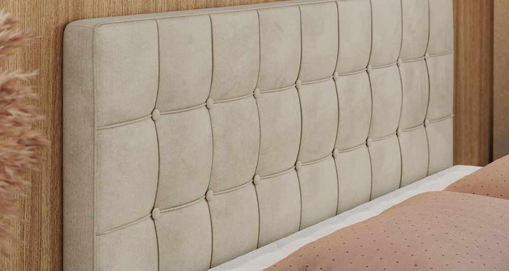 Vergrößern Sie das Kopfteil des Boxspringbettes, das Foto zeigt beige Stoff