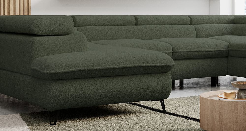 Zoomen Sie auf die Sitzfläche des Ecksofas. Sofa aus Grün Boucle-Stoff