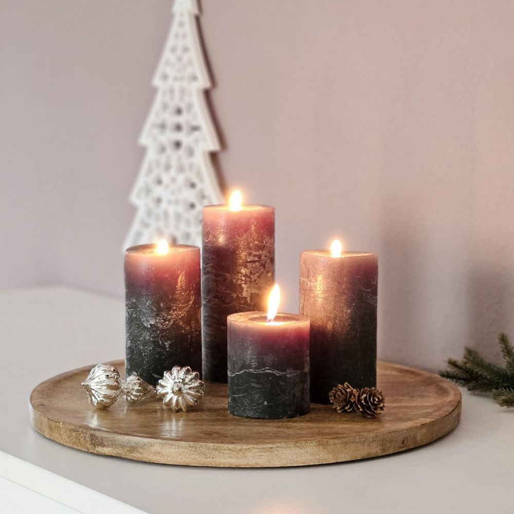 Dekoteller aus Mango weihnachtlich dekotiert.