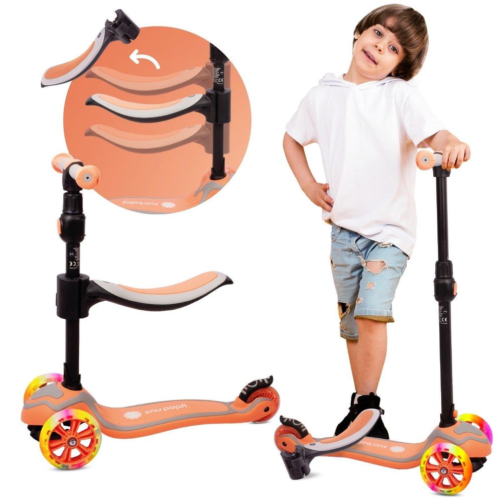 Patinete infantil SUN BABY con niño mostrando ajuste de altura y asiento.