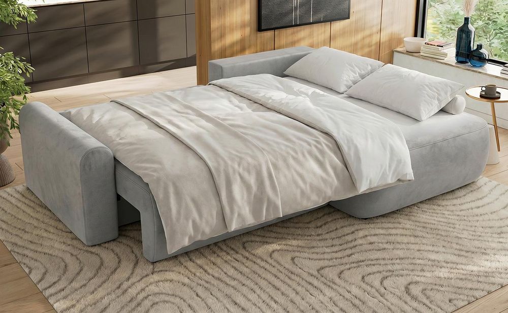 Graues Sofa mit ausgezogener Schlaffunktion im modernen Wohnzimmer.