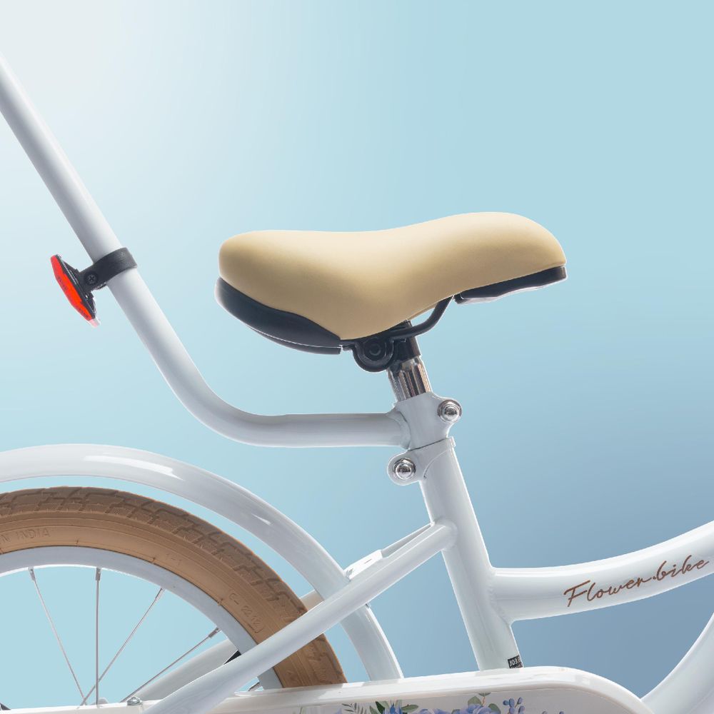Detalle del sillín acolchado y ajustable de la bicicleta Flower Bike.