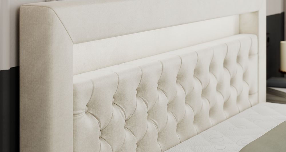 Vergrößern Sie das Kopfteil des Boxspringbettes, das Foto zeigt beige Stoff