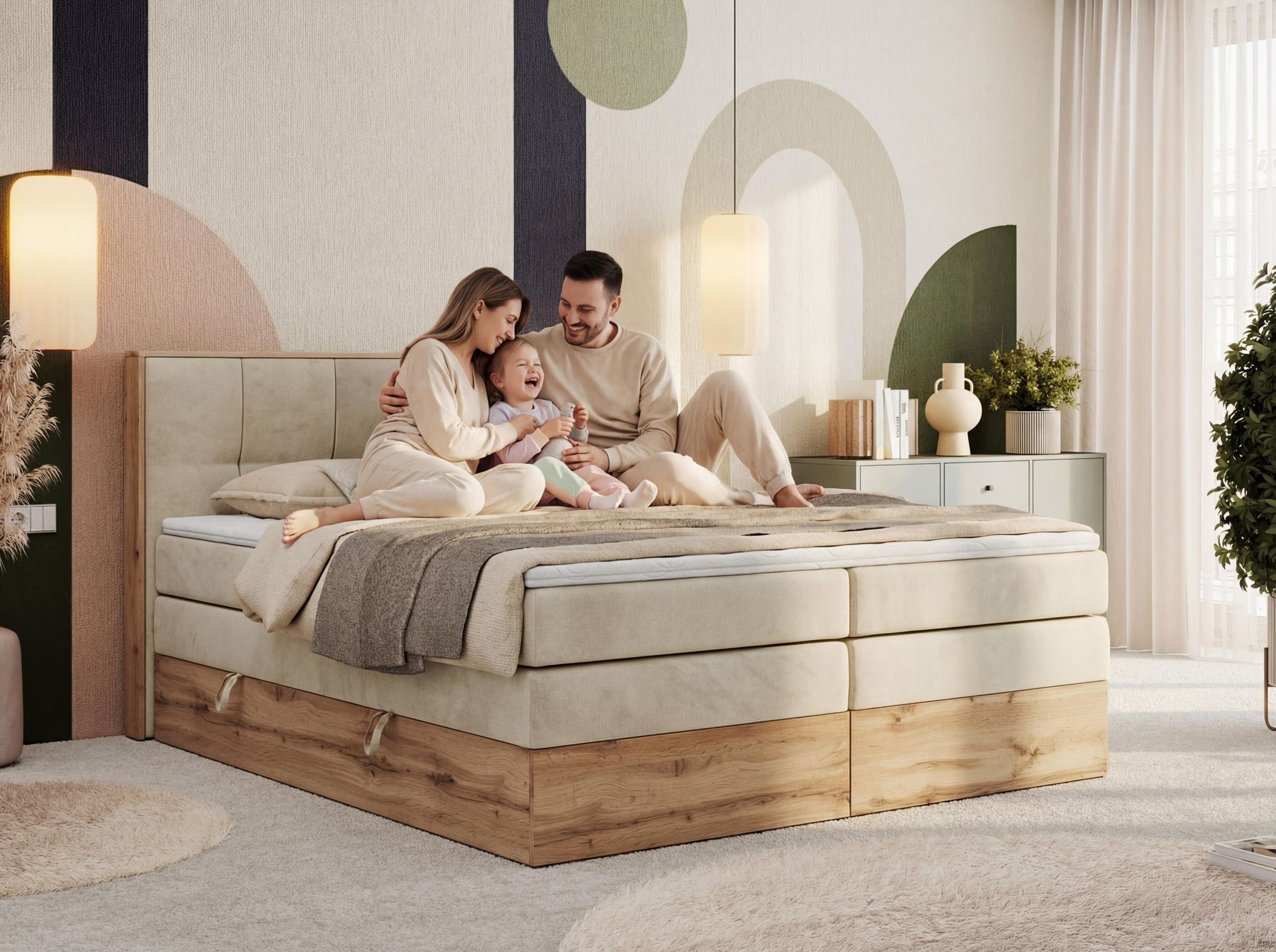 Familie entspannt auf beigen Boxspringbett im hellen Schlafzimmer.