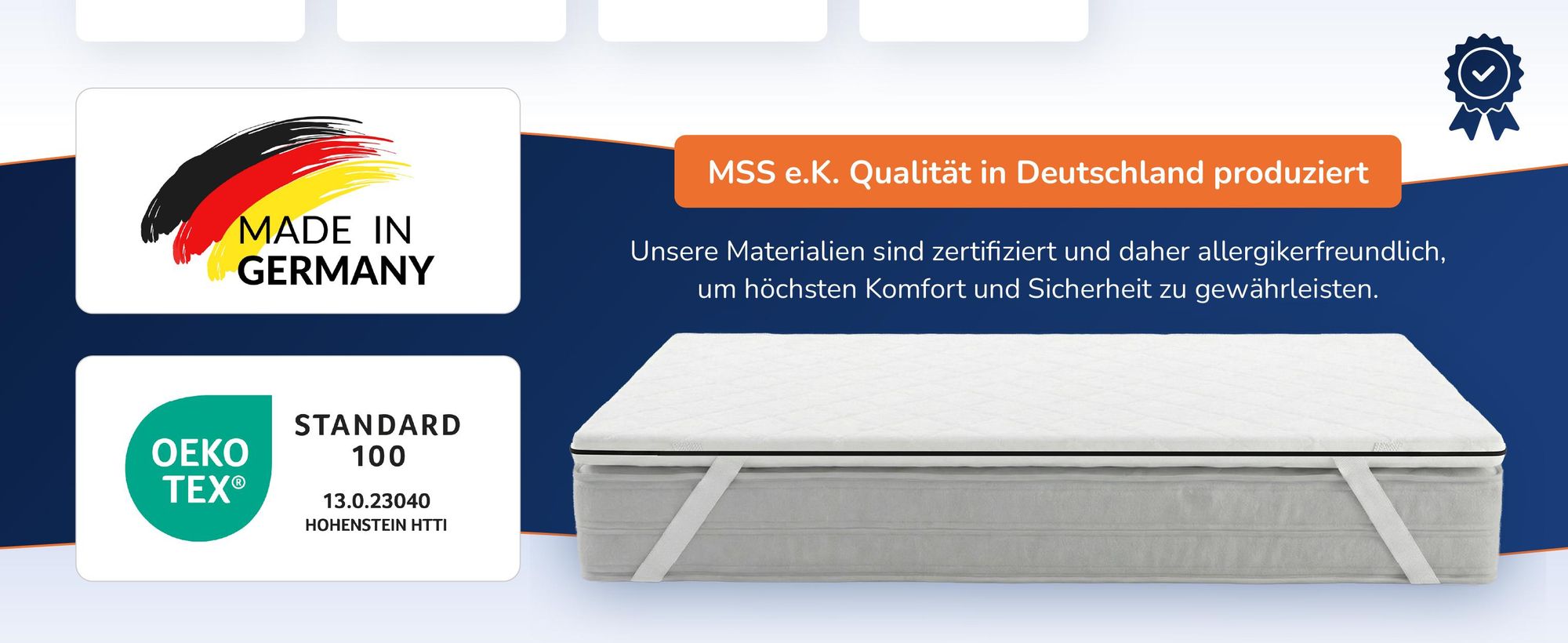 Freistehender Topper auf einem Bett, daneben zwei Siegel