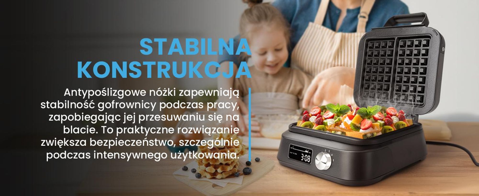 Czarna gofrownica z formą do pieczenia na dwa duże gofry