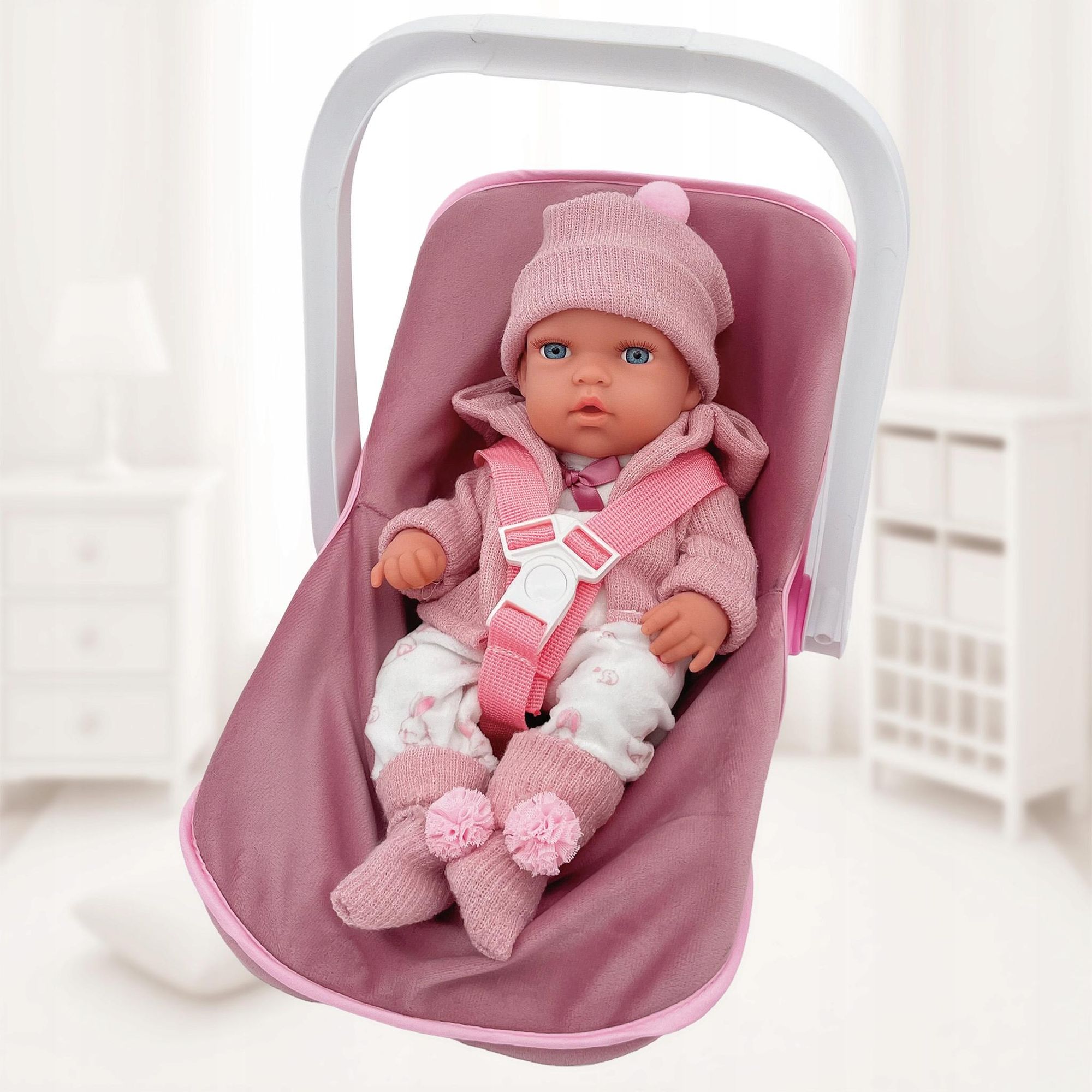 Babypuppe mit rosa Trage und Kleidung