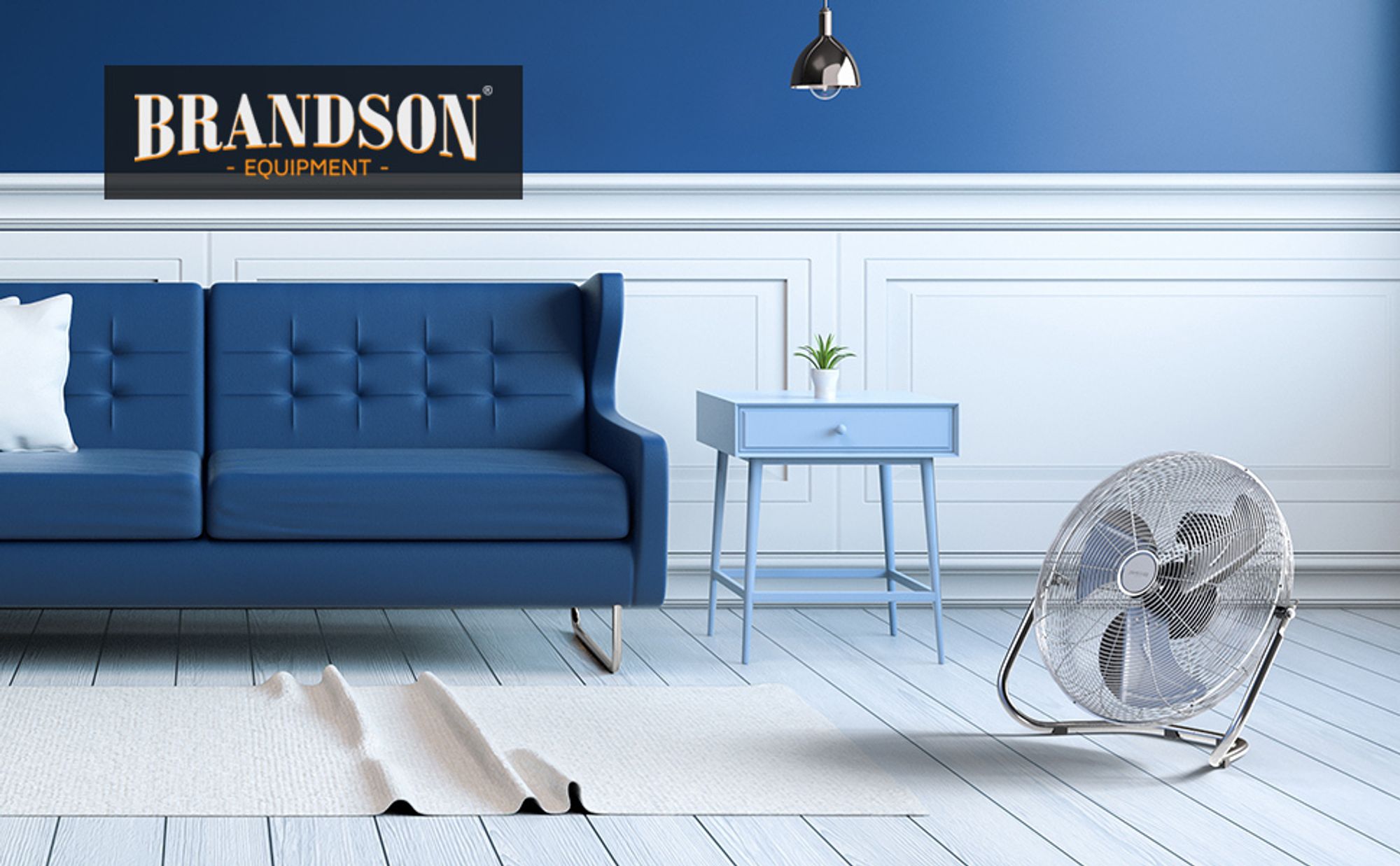 Retro-Windmaschine auf dem Boden vor blauem Sofa und Beistelltisch im Wohnzimmer