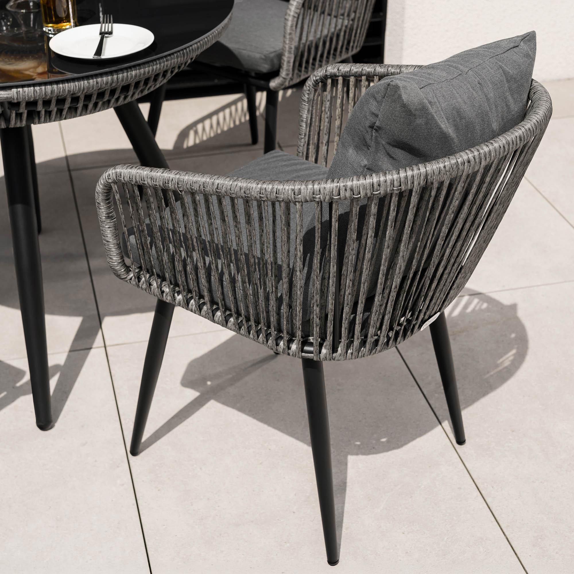 di volio Gartenmöbel Set RIETI - Grau, Sitzgruppe outdoor aus Polyrattan, Essgruppe mit 4 Stühlen und rundem Glastisch, wetterfest