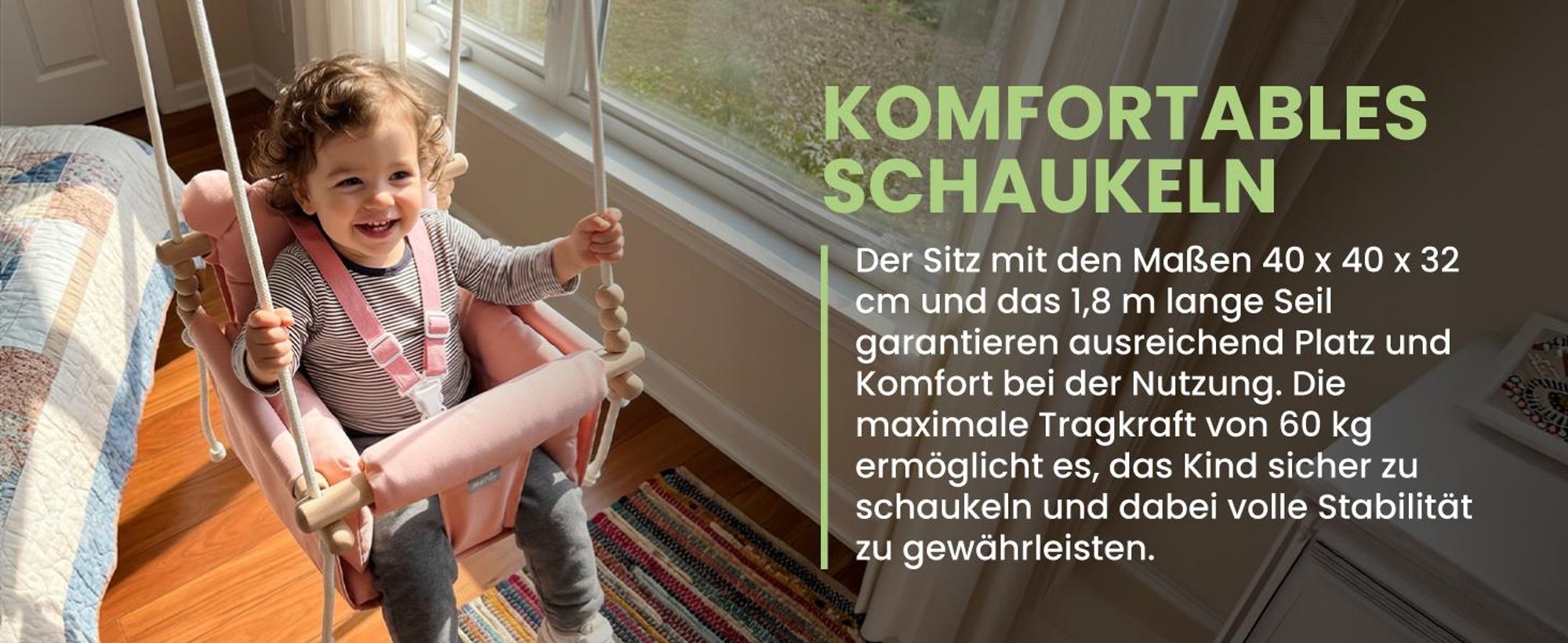 Rosa Kinderschaukel an Seilen mit Baumwollkissen