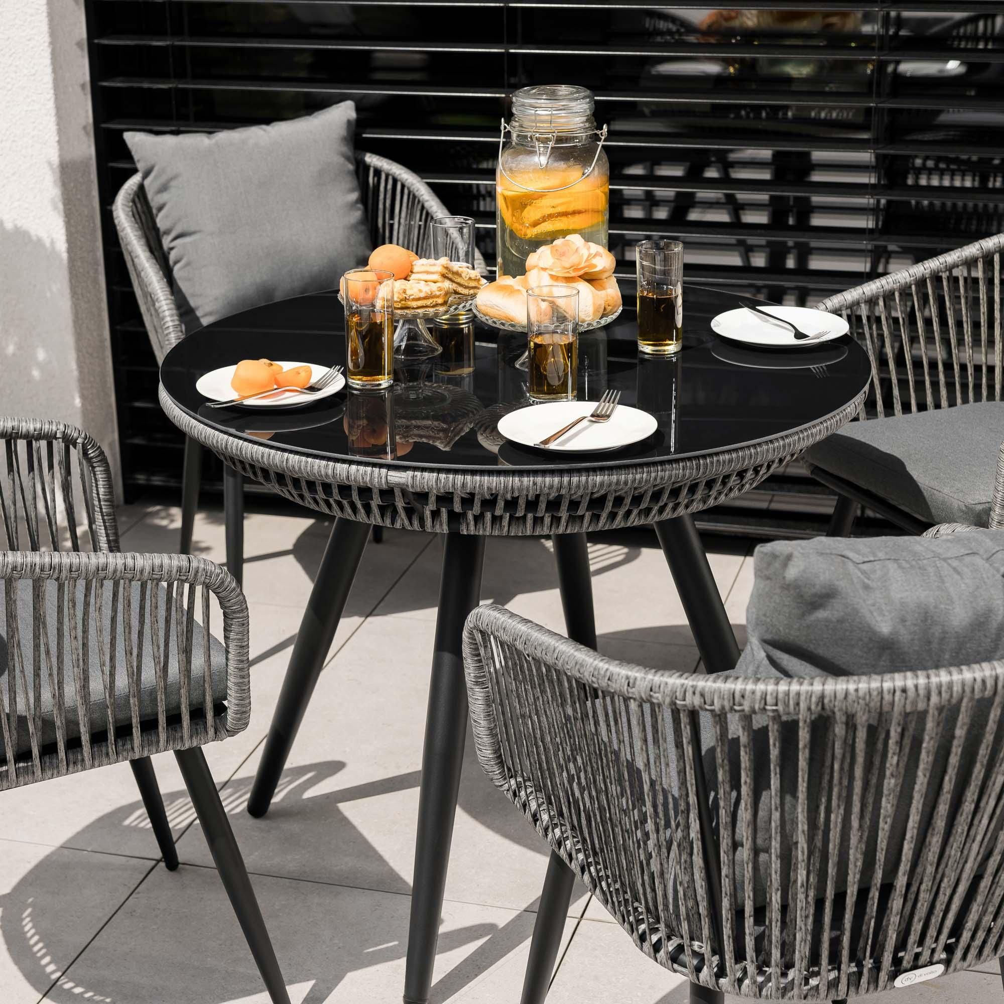 di volio Gartenmöbel Set RIETI - Grau, Sitzgruppe outdoor aus Polyrattan, Essgruppe mit 4 Stühlen und rundem Glastisch, wetterfest