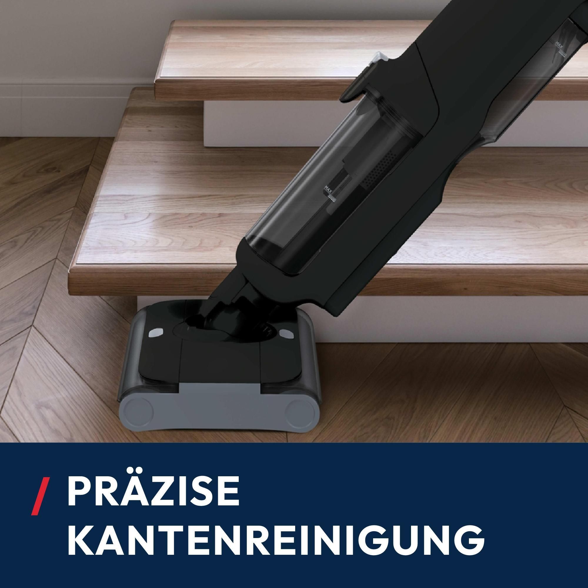 Staubsauger in Anwendung auf der Treppe